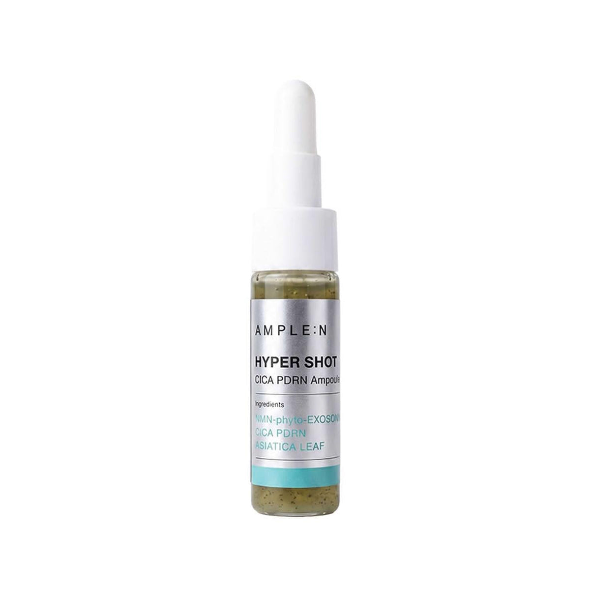 Mini Sérum Facial reparador en frasco con gotero blanco, líquido transparente y perlas botánicas verdes visibles.