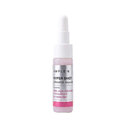Mini Sérum Facial reparador en frasco gotero transparente, etiqueta blanca y detalles rosados, con ceramidas.