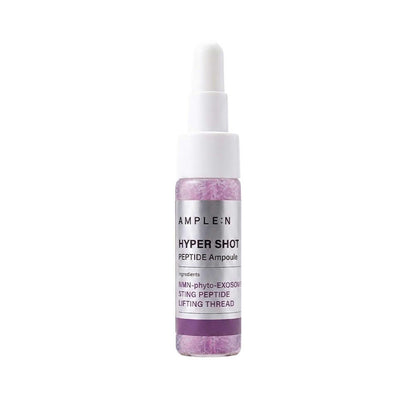 Mini Sérum Facial reafirmante en frasco con gotero blanco, envase transparente con detalles morados y etiqueta AMPLE:N.